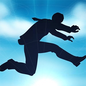 Silhouette of businessman jumping a gap